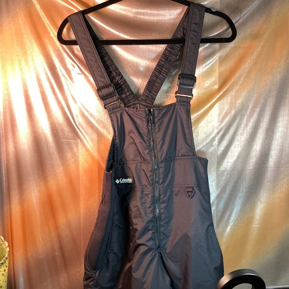 Columbia black snow jumper. 14/16‎ 30” waist  53” long 150